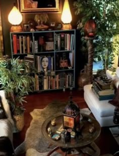 a living room filled with lots of furniture and bookshelves