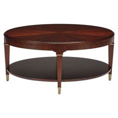 an oval coffee table with two shelves on each side