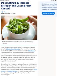 a person holding a white bowl filled with green beans