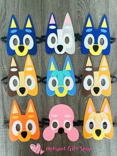 the paper masks are made to look like cats, dogs and other animal faces with different colors