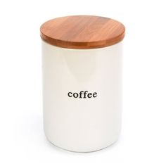 a white coffee canister with a wooden lid and the word coffee on it's side