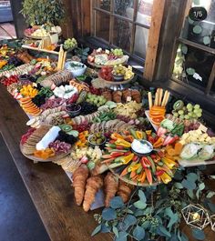 a table filled with lots of different types of food