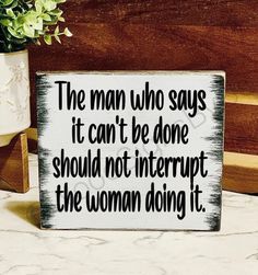 the man who says it can't be done should not interpret the woman doing it