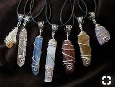 five different types of necklaces with wire wrapped around them