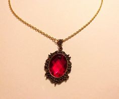 Victorian red necklace gold necklace filigree necklace pendant | Etsy Victorian Ruby Necklace, Red Amulet Necklace, Vintage Necklace Victorian, Victorian Jewelry Necklace, Nerd Jewelry, Gold Ruby Necklace, Red Pendant Necklace, Vampire Necklace, Jewelry Victorian