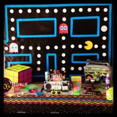 Totally Rad 80's Party Table - Pacman background, Rubic cube, boom box, nerds, leg warmer, fishnet gloves etc! Pacman Birthday Party, Diner Birthday Party, Scaffold Board Table, Sulking Room Pink, Side Table Rustic, 80s Party Decorations