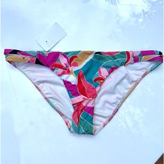 Billabong Wild Sun Lowrider Bikini Bottoms Size Xl The Wild Sun Bikini Sets The Salt Saturation To Maximum With A Bold Tropical Print. Printed With Vibrant Tropical Florals, The Updated Lowrider Features Tabs At The Side Seams With A Classic Cut: A Taller Front And Back Rise And Fuller Bum Coverage, Creating A Flattering Fit For All Shapes. Bottom Only Brand New With Tags Smoke Free Home Tropical Florals, Billabong Swim, Lowrider, Tropical Print, Billabong, The Wild, Pink Blue, Salt, Sun