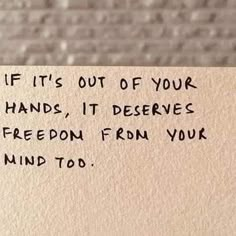 a piece of paper with the words if it's out of your hands, it deserves freedom from your mind to