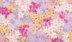 an image of a colorful flower pattern on a pink wallpaper with white and yellow flowers