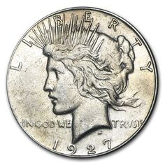 an old silver coin with the head of a woman's face in profile, on a white background