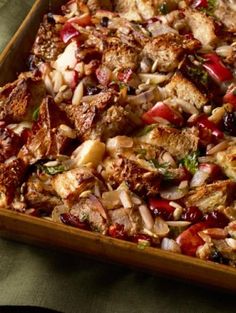 a casserole dish filled with meat and vegetables