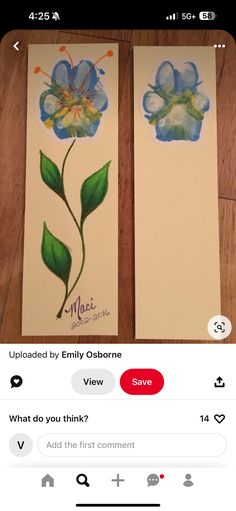 two cards with watercolor flowers on them, one is blue and the other is green