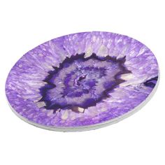 an image of a purple flower that looks like it is in the middle of a circle