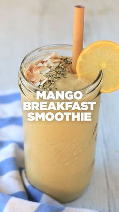 a mason jar filled with mango breakfast smoothie