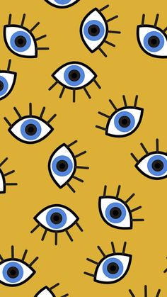 an eye pattern with blue and white colors on a yellow background that looks like eyes