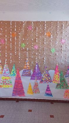 a bulletin board with christmas trees on it