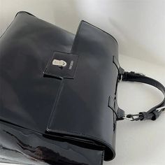 Trendy Female Briefcase Patent Leather Shoulder Laptop Bag for Women Messenger Bag Large Capacity Commuter Big Handbags black SPECIFICATIONS Lining Material: Polyester Main Material: Patent Leather Place Of Origin: GUANG DONG Province Place Of Origin: GUANG DONG Province Shape: Casual Tote Occasion: Versatile Exterior: Solid Bag Model Number: B125 Closure Type: hasp Decoration: NONE Hardness: SOFT Gender: WOMEN Pattern Type: Solid Interior: Cell Phone Pocket Interior: Interior Zipper Pocket Style: fashion update.24.06 Size: 40CM wide, 30CM high, 8CM thick shoulder strap 120CM Female Briefcase, Black School Bags, Big Handbags, Mens Backpack Travel, Briefcase Women, Retro Purse, Handbags Black, Laptop Bag For Women, Laptop Shoulder Bag