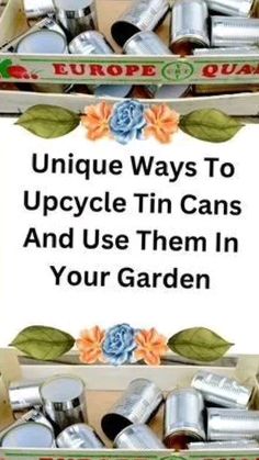 an open box filled with tin cans and flowers