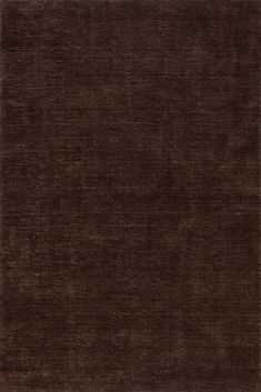 an area rug with dark brown colors