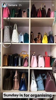 a closet filled with lots of different colored purses