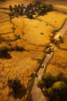 an aerial view of the countryside with houses and trees