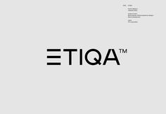 the logo for etqa is shown in black on a gray background with white letters