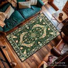 a living room with a green couch and rug