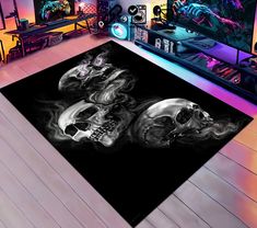 two skulls on a black rug in a room with neon lights and other items behind them