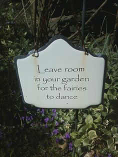 a sign that says leave room in your garden for the fairies to dance