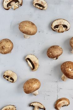 several mushrooms on a baking sheet ready to be cooked