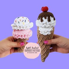 two crocheted ice cream cones are being held up in front of a purple background