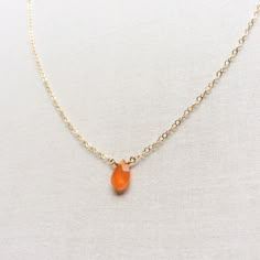 "This Carnelian necklace is made of genuine high quality faceted Carnelian. There are gold filled ,sterling silver and 14kt gold chain you can choose from. There are 2 sizes that you can choose from 16\" or 18\" in gold filled, sterling silver or 14k gold. This tiny carnelian necklace is light weight and elegant. The Carnelian jewelry stone is around 1.5 carats. This tiny carnelian necklace is great for layering with other gold necklaces. This orange stone necklace is delicate and perfect to go Gold Carnelian Jewelry With Faceted Beads, Gift Chalcedony Faceted Necklaces, Gift Carnelian Crystal Necklace In Orange, Orange Faceted Jewelry Gift, Orange Carnelian Crystal Necklace As Gift, Orange Carnelian Crystal Necklace For Gift, Orange Carnelian Crystal Necklace Gift, Amber Necklaces With Faceted Beads For Gift, Amber Faceted Beads Necklace For Gift