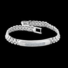 Platinum Kada, Bangles & Bracelets by Jewelove Men of Platinum Platinum diamond bracelet for men. PGI Code 23PTMKB22. Metal : Platinum  Platinum Purity : 95% Purity Mark : Pt 950 Estimated Weight : 37.01 grams  Diamond Weight : 0.47 cts. Diamond Clarity : VVS or SI (as selected above) Diamond Color : GH or IJ (as selected above) Diamond Grading Report : SGL Certificate of Authenticity : Platinum Guild International Luxury Diamond Bracelet For Anniversary, Kada Bangles, Mens Diamond Bracelet, Om Pendant, Platinum Bracelet, Platinum Rose Gold, Bangles Bracelets, Wedding Jewelry Bracelets, Bracelet For Men