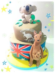 an australian hat cake with a koala bear and kangaroo on top