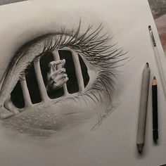 a pencil drawing of an eye looking through a cage