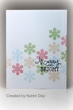 a card with snowflakes on it and the words merry and bright written in black