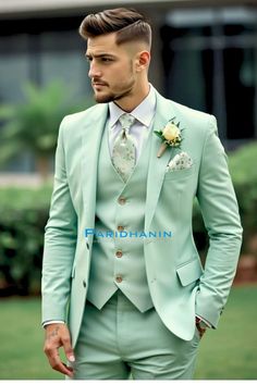 =>UNIQUE CREATION - PLEASE RESPECT COPYRIGHT<= All images and content on this site are exclusively crafted and owned by Paridhanin. Unauthorized copying, sharing, or reproduction is prohibited and will be subject to legal action. A confident man dressed in a 3pc luxurious suit crafted from a polyester blended fabric in a light green color. The suit pairs with a white dress shirt and a floral-patterned tie that matches the pocket square tucked into his breast pocket. A boutonniere featuring a light-colored rose and greenery is pinned to his lapel, adding a touch of elegance.  The price includes Jacket, vest and pant only. Other accessories if you want like shirt, tie  etc will be available on extra cost. For this message us in personalisation box. Whether you're attending a wedding, graduat Green Notch Lapel Blazer For Wedding, Light Green Tuxedo, Green Three-piece Suit For Semi-formal Occasions, Tailored Green Wedding Blazer, Formal Fitted Pista Green Sherwani, Fitted Green Semi-formal Sets, Green Fitted Semi-formal Sets, Fitted Green Tuxedo For Wedding, Fitted Green Wedding Suit