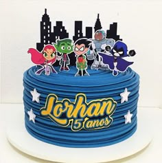 a birthday cake with cartoon characters on it