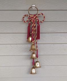 bells hanging on the side of a house