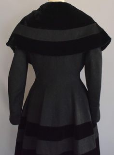 Victorian Black Winter Outerwear, Fitted Cape For Costume, Winter Season, Fitted Cape For Costume And Winter, Fitted Cape For Winter Costumes, Fitted Cape For Costume Occasions In Winter, Elegant Fitted Winter Capelet, Fitted Black Wool Coat For Evening, Vintage Black Cape For Winter, Vintage Black Winter Cape