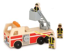 a wooden toy fire truck with two figures next to it