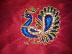 a red jacket with a peacock design on the front and side, embroidered onto it