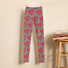 Our Checkerboard Love Valentine Leggings are the perfect blend of style and comfort for toddler, teen, and tween girls. These 90s style black, white, and red heart pattern tights create a fun optical illusion, making them a standout choice for any occasion. Whether it's Valentine's Day, a family fun run or just a stylish day at school, these versatile yoga pants are ideal for youth dance, active wear, or casual outings. They make a thoughtful gift for birthdays, Christmas, or any holiday, ensuri Red Yoga Pants, White Yoga Pants, Pattern Tights, Red Heart Pattern, Red Heart Patterns, Patterned Tights, Fun Run, Girls Leggings, Girls Black