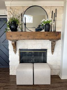 a fireplace mantel with a mirror above it