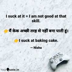 a video game controller sitting on top of a white counter next to a quote from nisha