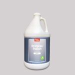 a gallon of white liquid on a gray background