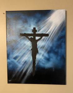 a painting of the crucifix with clouds and light coming from behind it