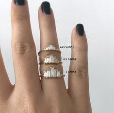 a woman's hand with three different rings on it and the measurements for each ring