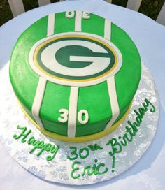 a green bay packers birthday cake on a table