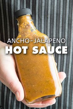 ancho jalapeno hot sauce in a glass bottle with text overlay